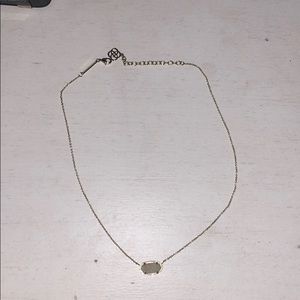 Kendra Scott necklace.